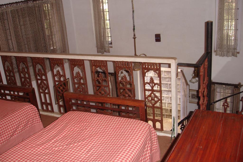 The Red House Bed & Breakfast Ooty Room photo